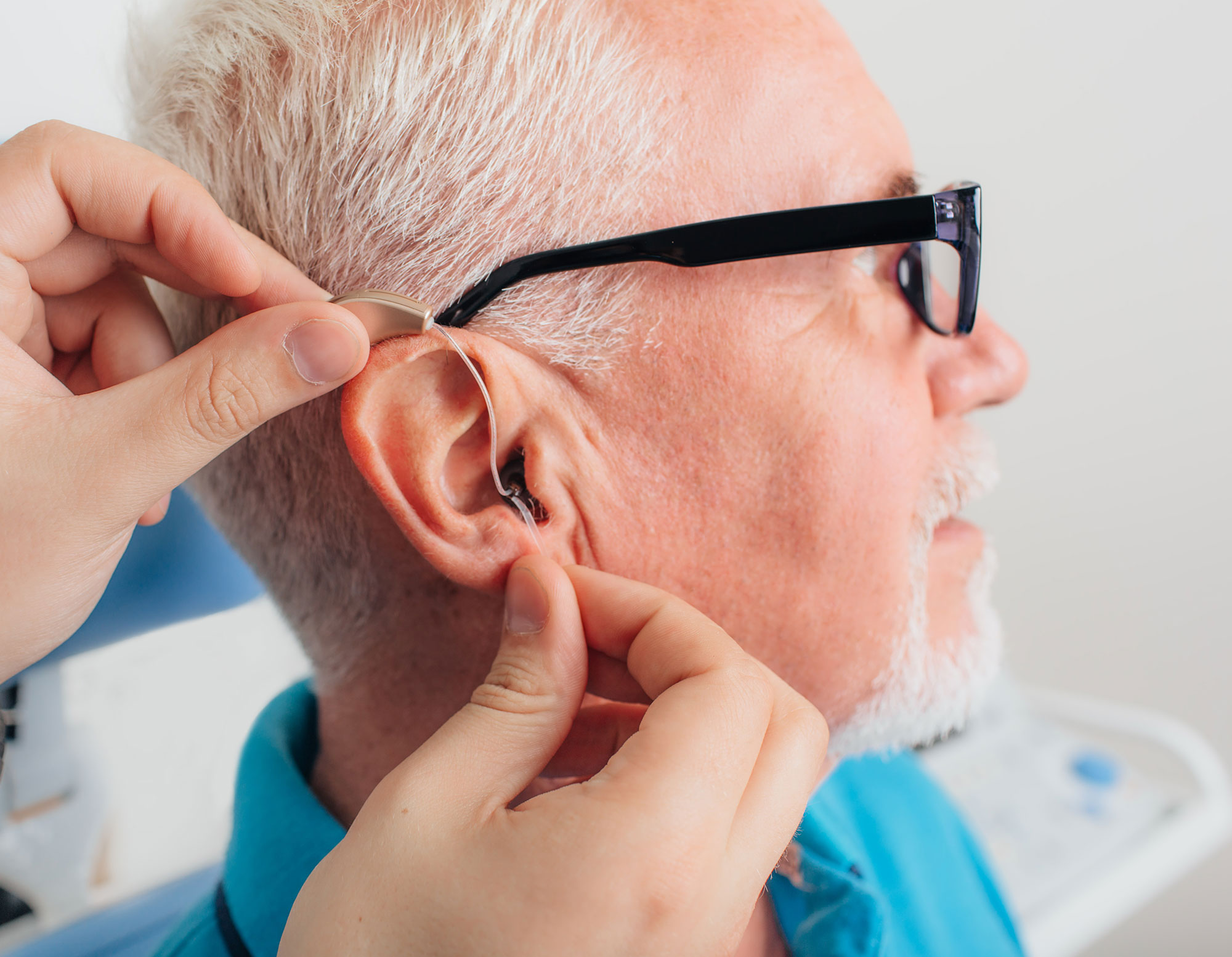 Adjusting of a hearing aid for an aged man